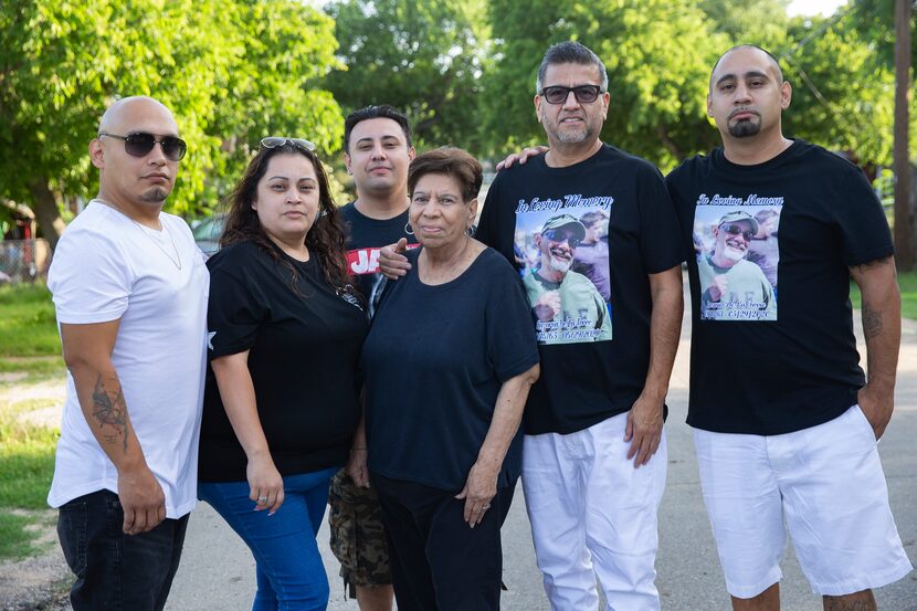 Lazarus De La Torre's mother, Dora (center), with (from left) three of Lazarus' children —...