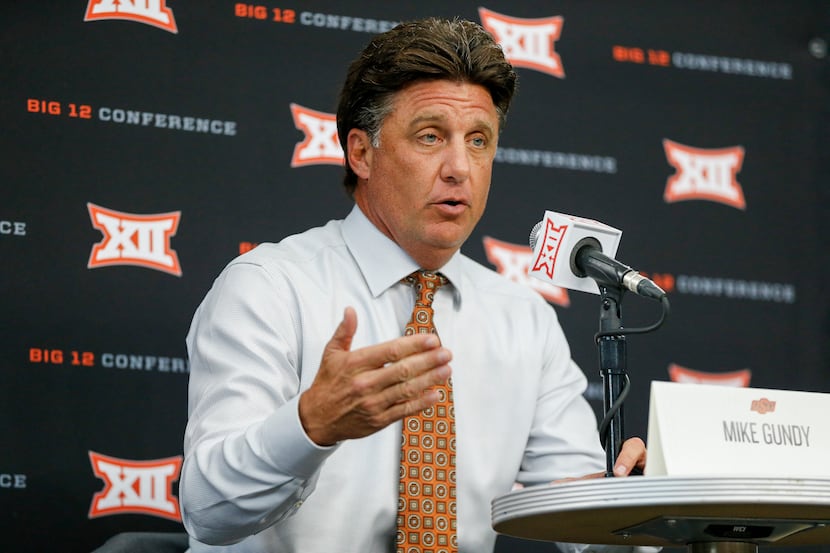 Oklahoma State head football coach Mike Gundy speaks  during a breakout session at the Big...