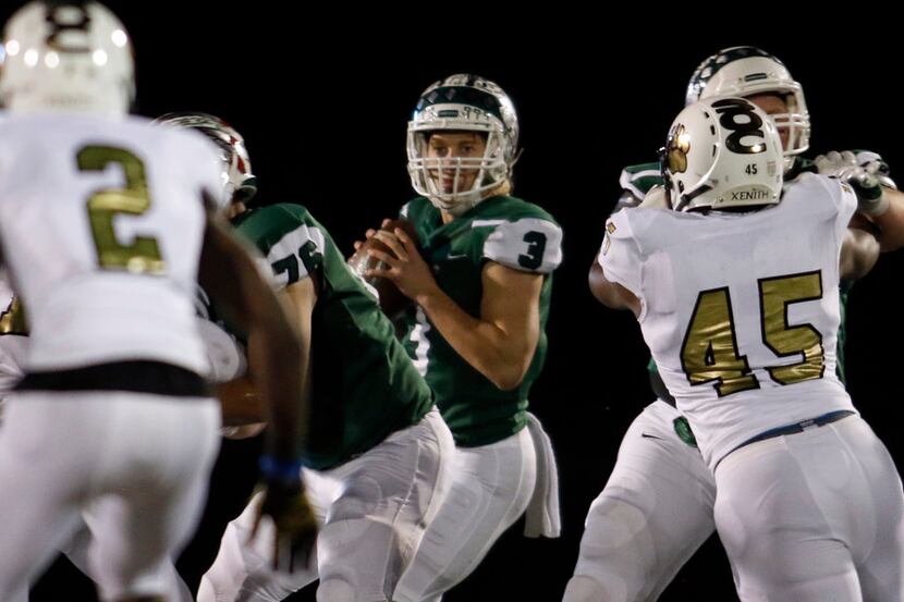 Waxahachie quarterback Bryce Salik (3) looks for an open receiver during second quarter...