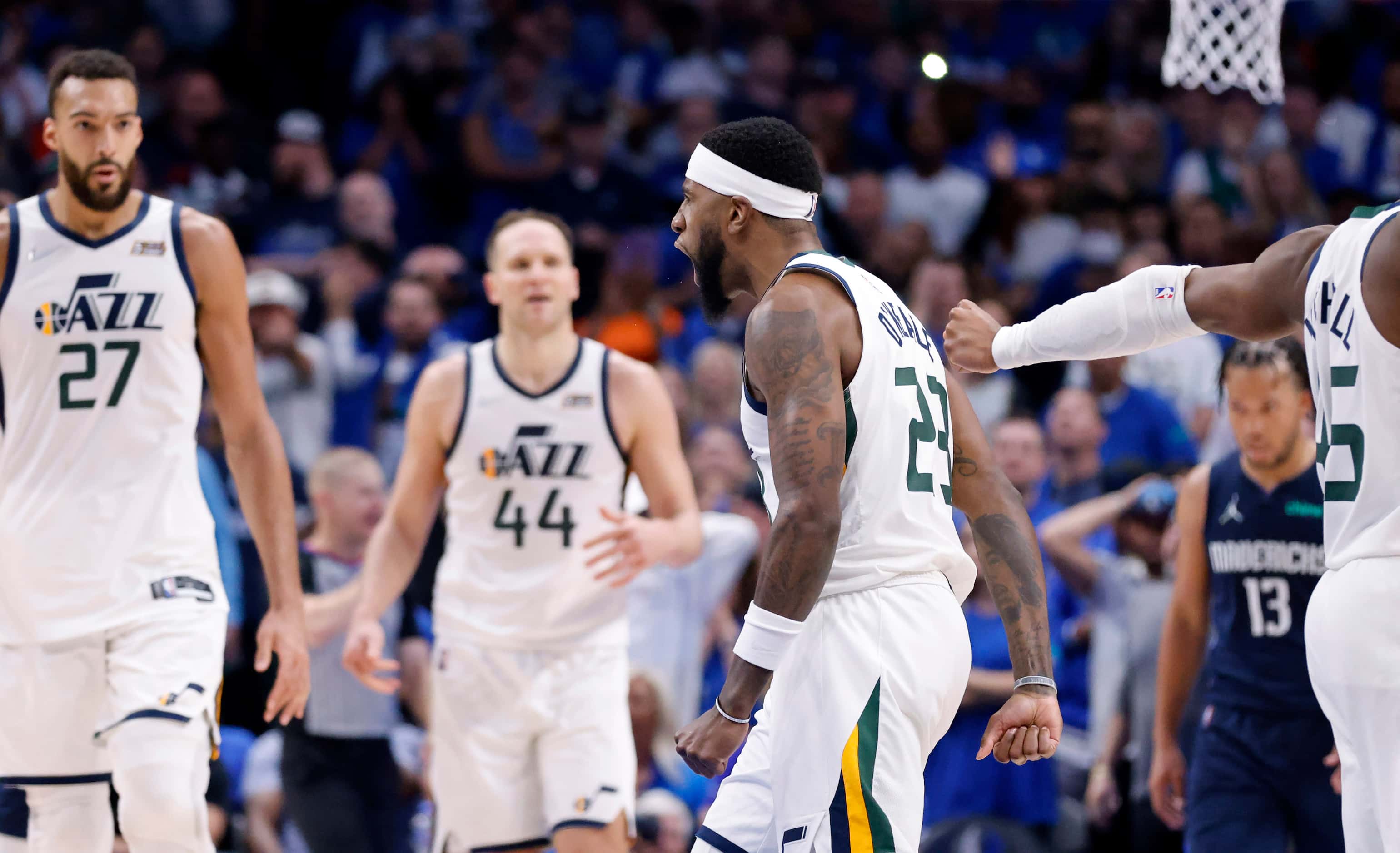 Utah Jazz forward Royce O'Neale (23) reacts after nailing a three-point shot late in the...