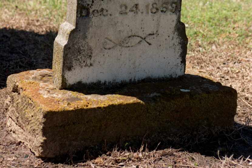 The marker for Britanna Santifee Chapman from 1859 is the oldest gravestone at the Mesquite...