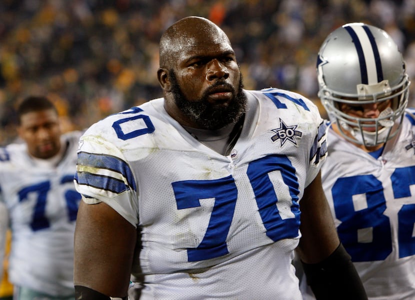 Dallas Cowboys guard Leonard Davis (70) makes his way back to the locker room after losing...