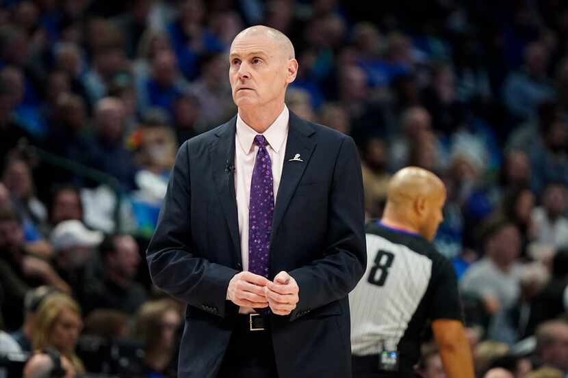 Mavericks head coach Rick Carlisle calls for a timeout during the first half of a game...