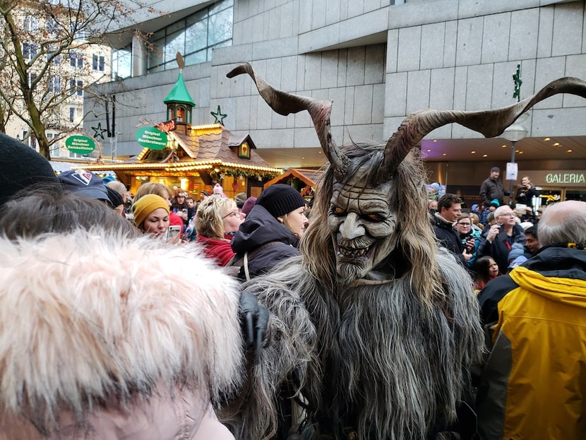 Around 300 Krampuses run amok at the Munich Christmas market.