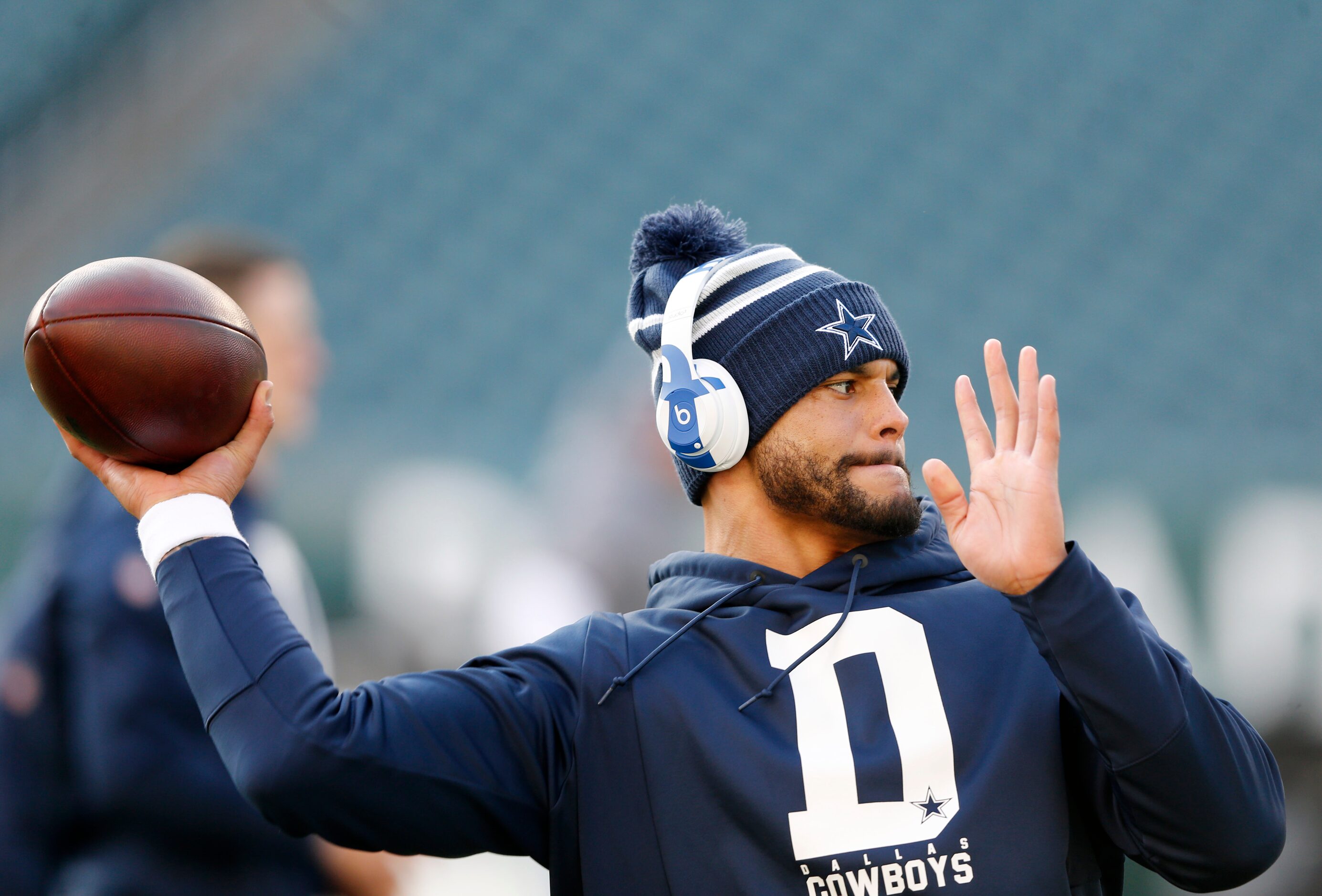 Dallas Cowboys quarterback Dak Prescott (4) throws the ball before warmups prior to a game...