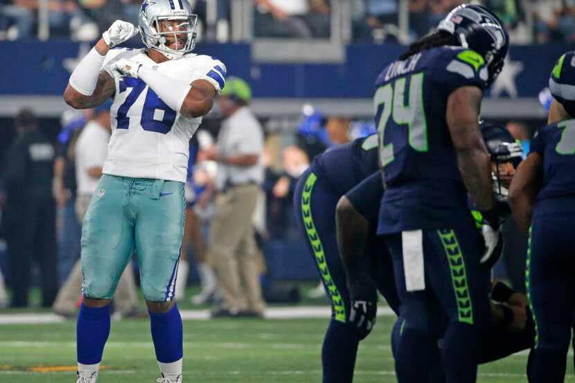 Dallas Cowboys defensive end Greg Hardy (76) dances to the music during a time out during...