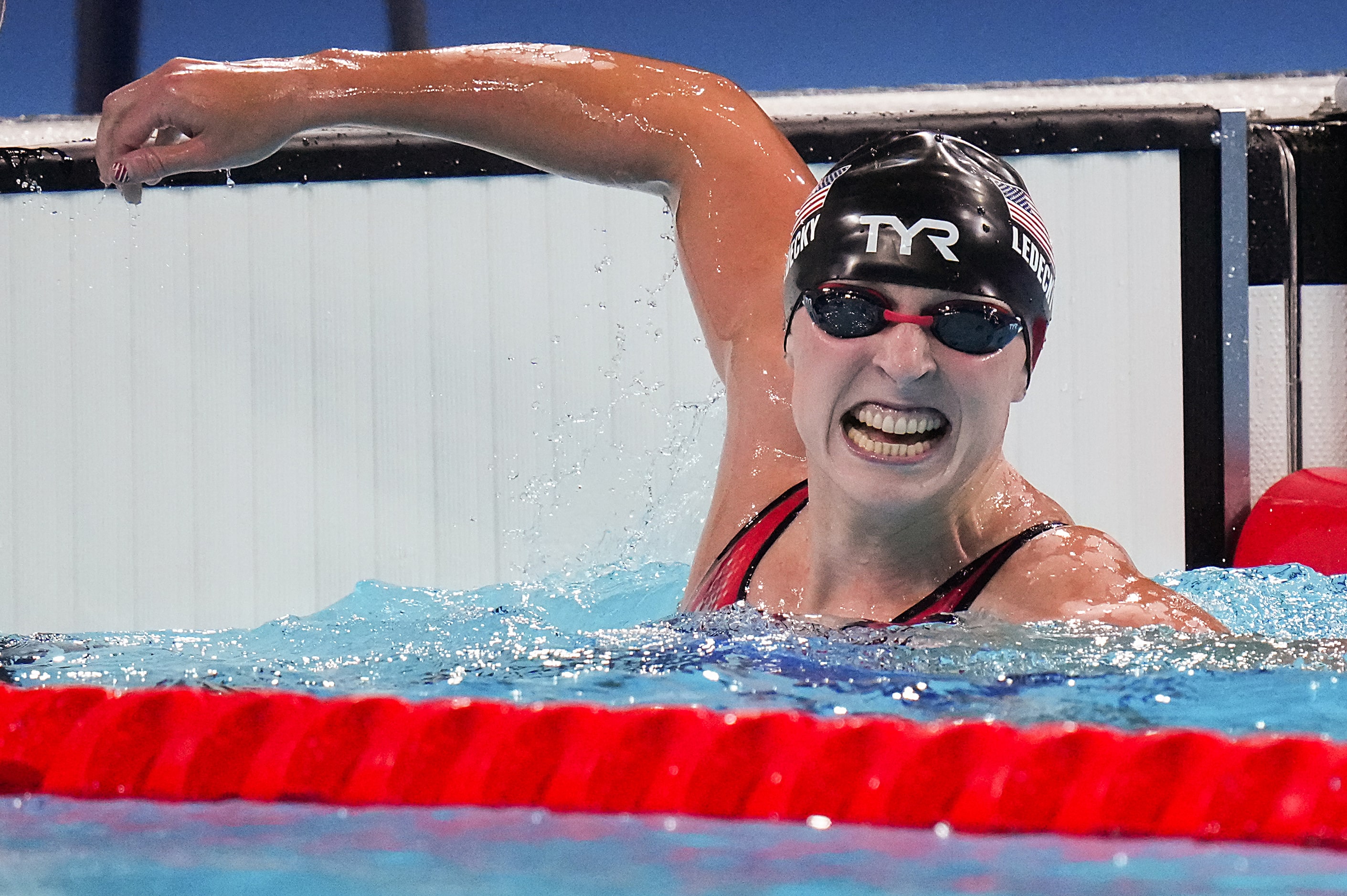 Katie Ledecky of the United States celebrates after winning the women's 1500-meter freestyle...