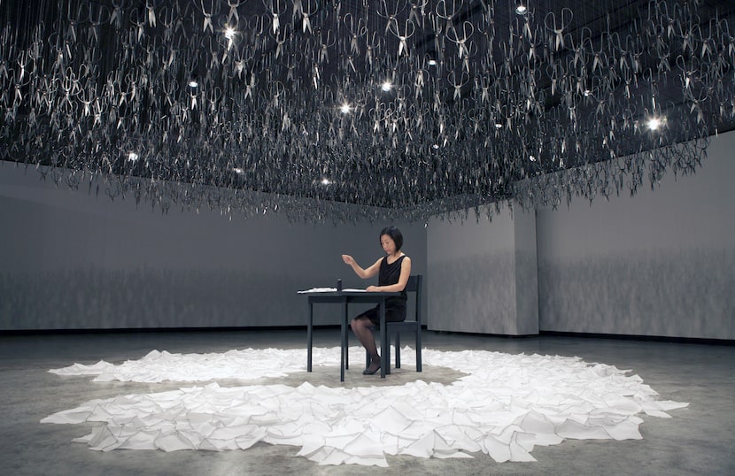 Austin artist Beili Liu's installation "The Mending Project" consists of 1,500 pairs of...