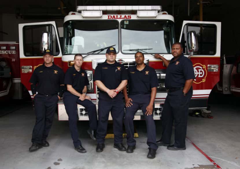 Dallas firefighters (from left) Derick Brouhard, Shane Farmer, Eric Talamantez, James...