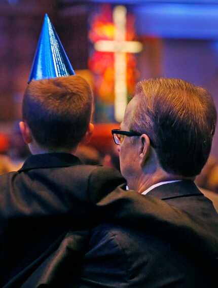 Congregants worship during the 150th anniversary service at First Baptist Church of Dallas...