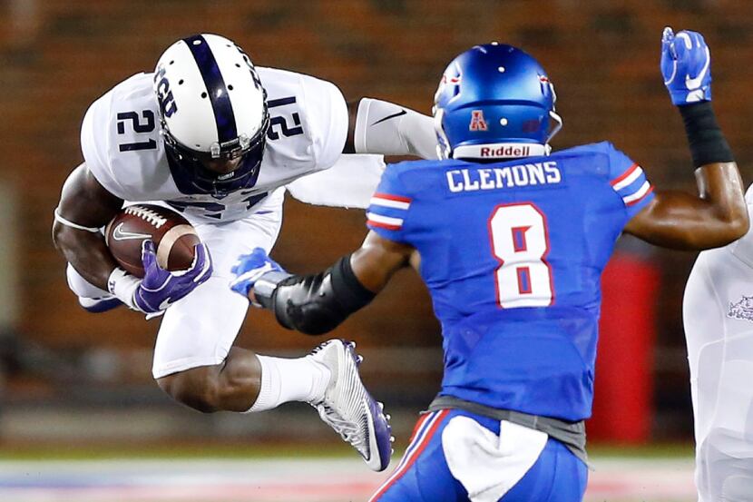 TCU Horned Frogs running back Kyle Hicks (21) is upended as he is hit by a Southern...