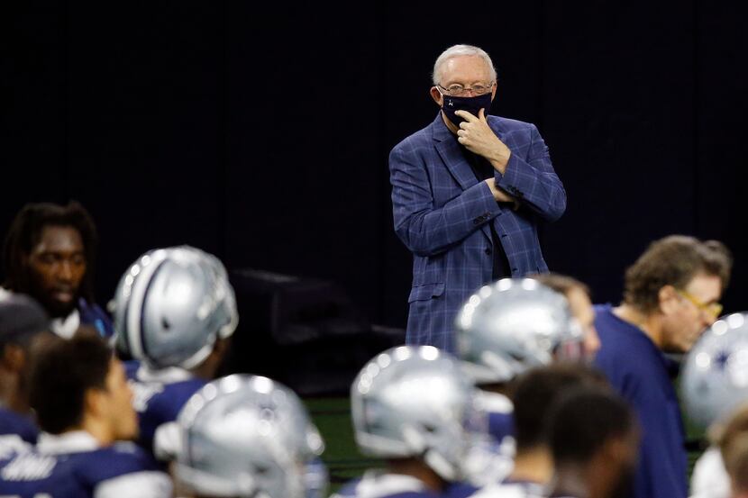 Dallas Cowboys owner and general manager Jerry Jones watches practice from the sidelines...