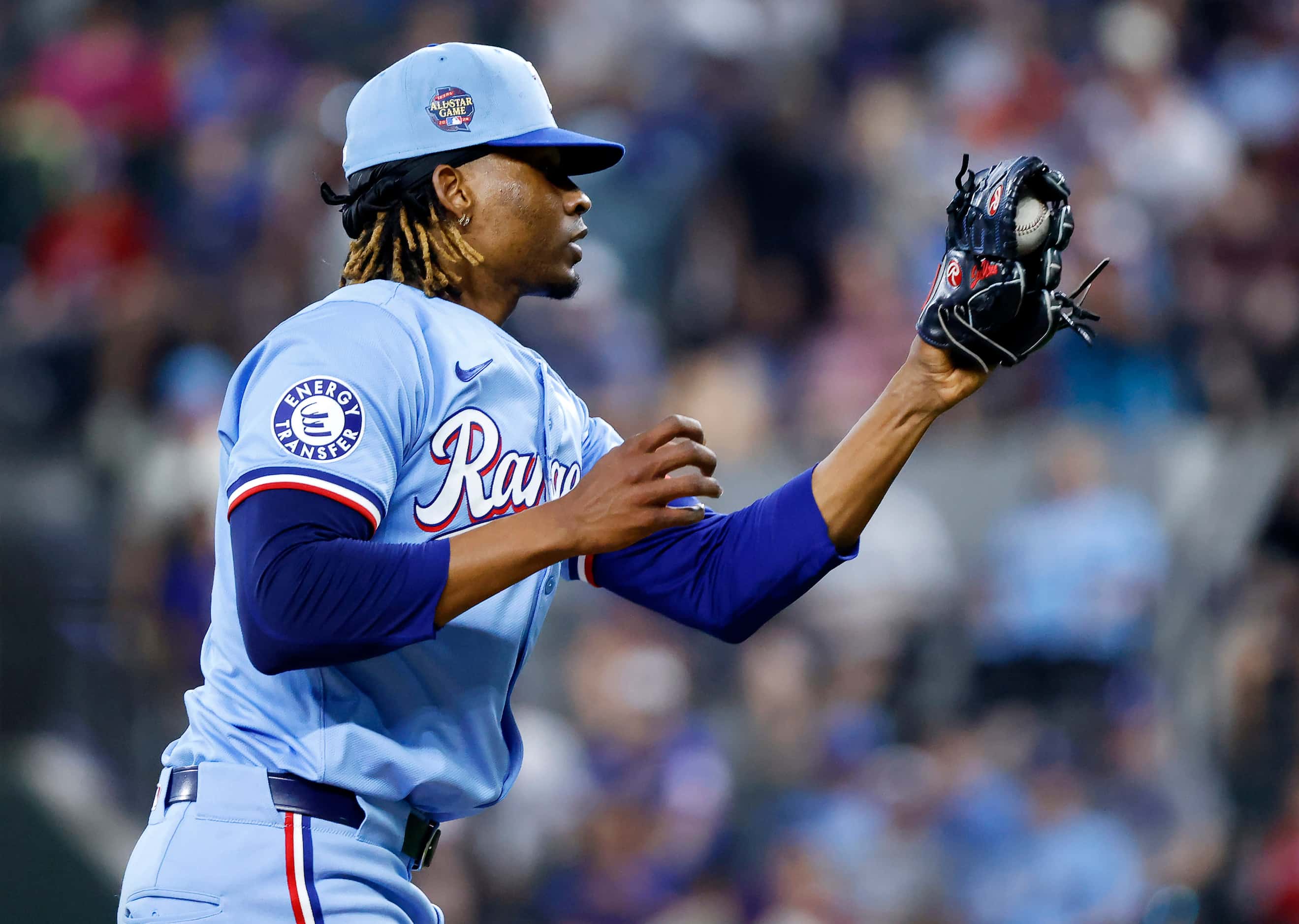 Texas Rangers pitcher José Ureña snares a bouncer back to the mound by Kansas City Royals MJ...