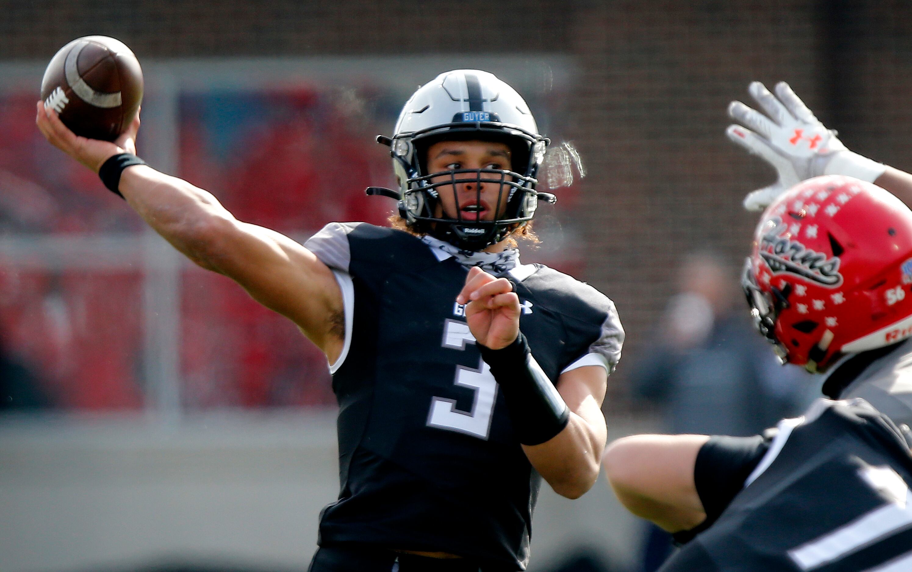 Denton Guyer High School quarterback Eli Stowers (3) throws a pass during the first half as...
