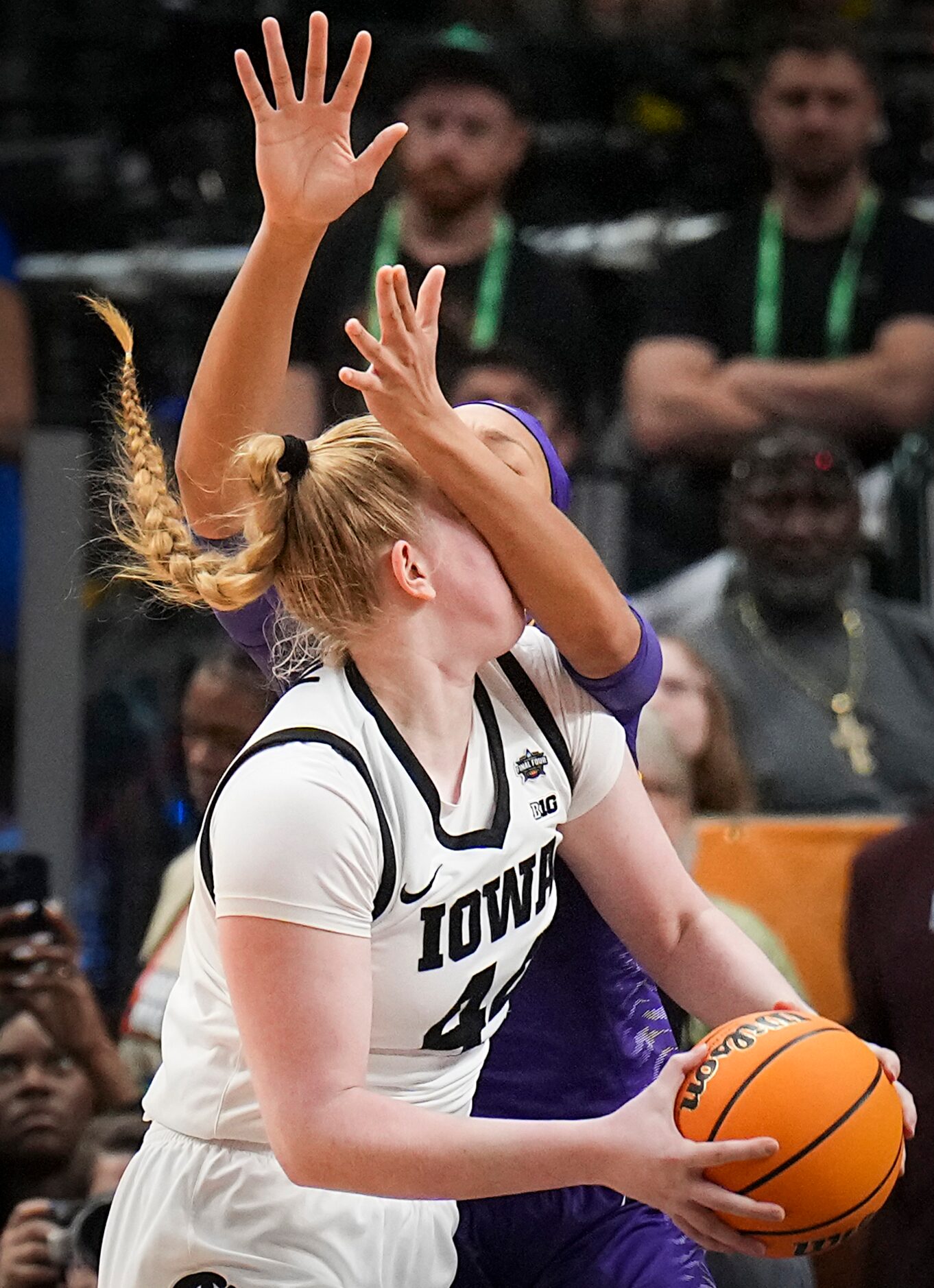 Iowa forward Addison O'Grady (44) tries to drive to the basket against LSU forward LaDazhia...