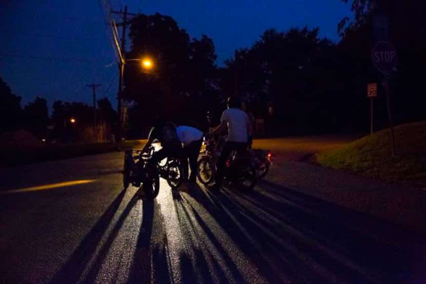 
Oliver Sitrin, 35, of Oak Cliff, as well as other members of Pine Box Pedal Club, stop at a...