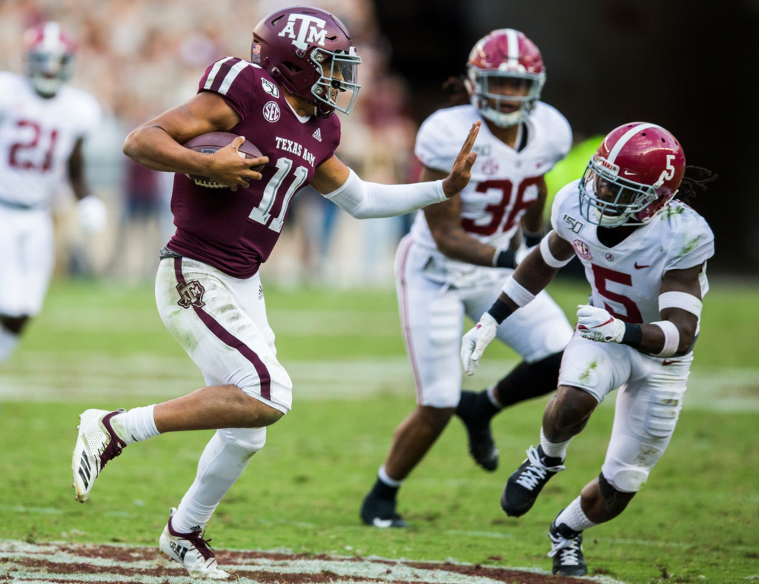 Texas A&M Aggies quarterback Kellen Mond (11) runs the ball against Alabama Crimson Tide...