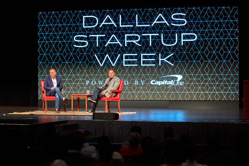 A photo from Dallas Startup Week, featuring Abe Minkara onstage with another presenter in...