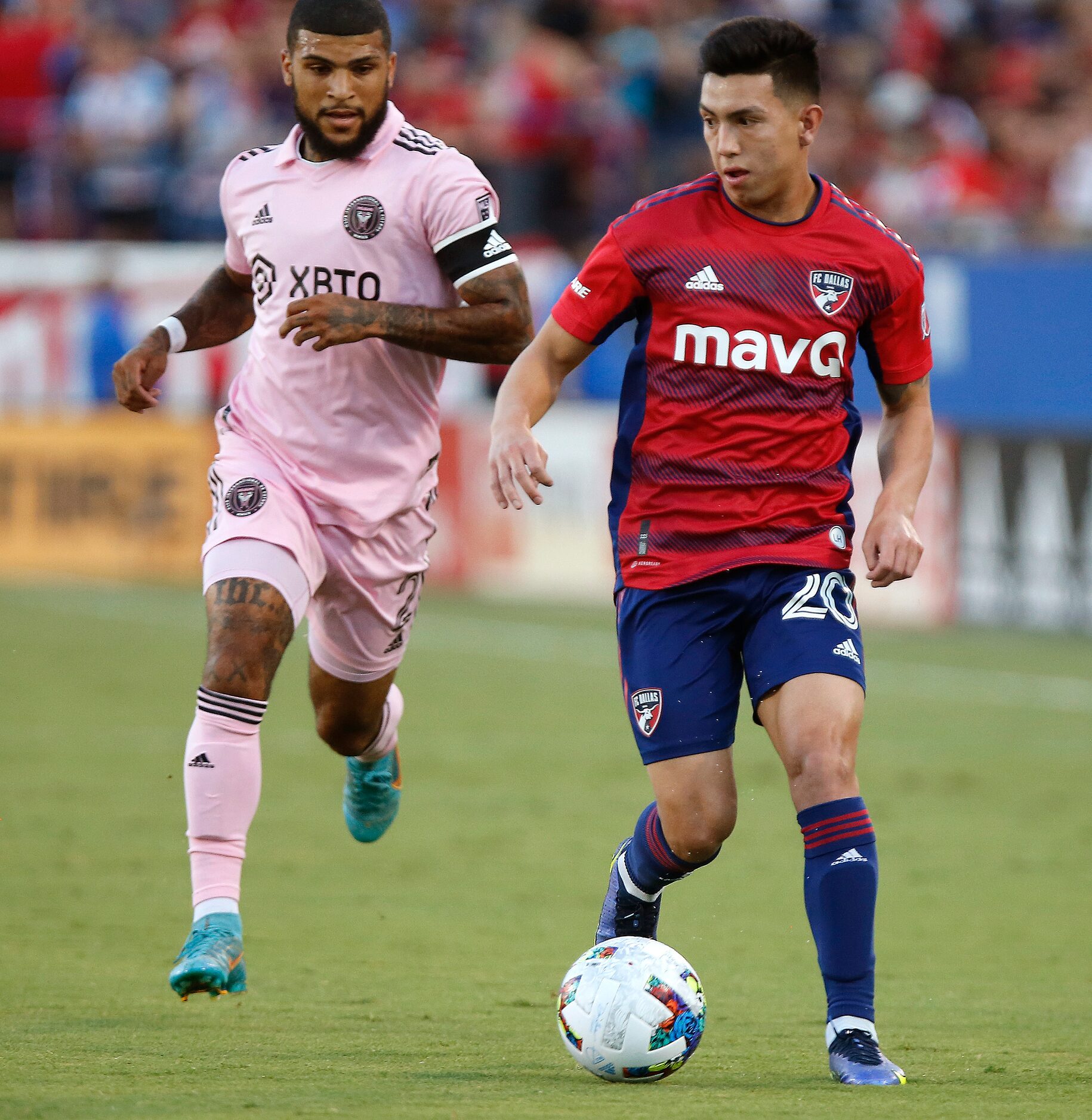 FC Dallas forward Alan Velasco (20) is chased by Inter Miami defender DeAndre Yedlin (2)...