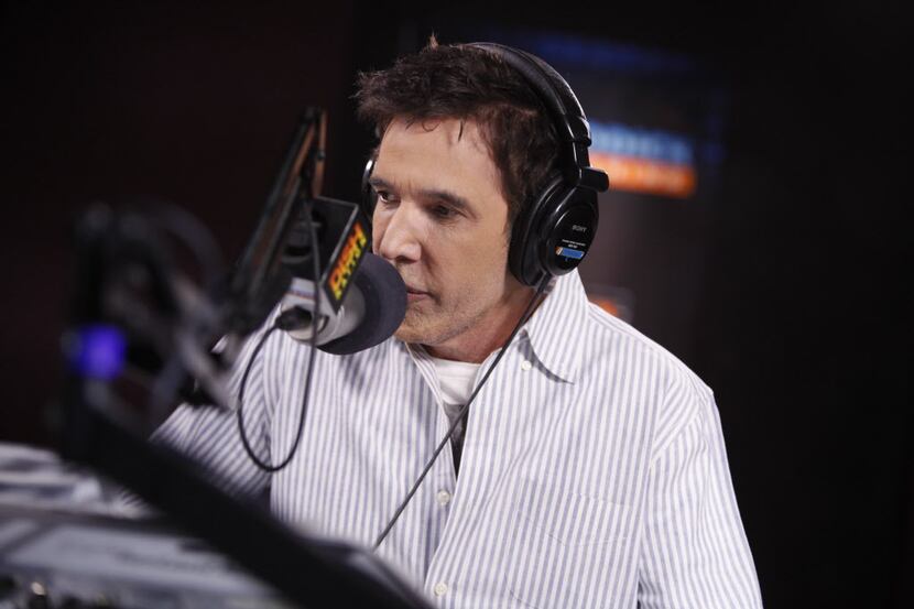 Kidd Kraddick at the microphone at the studio he built in Las Colinas.