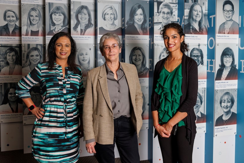 Dr. Julie Mirpuri, associate professor (left), Joan Conaway, vice provost and dean of basic...