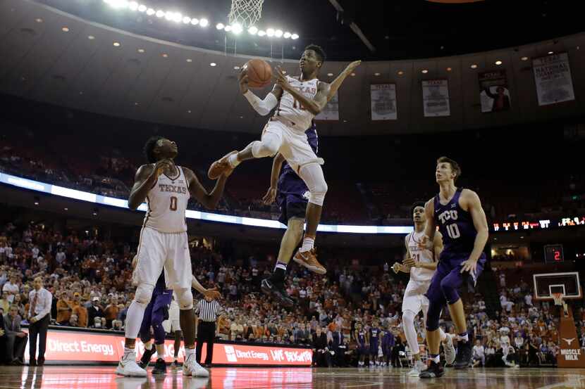Texas guard Kerwin Roach Jr. (12) drives to the basket against TCU during the second half of...