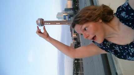 Ann Pinson with Reunion Tower for Guide.