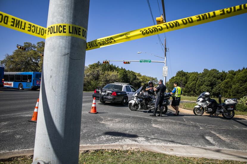 AUSTIN, TX - MARCH 19:  Police tape marks off the neighborhood where a package bomb went off...