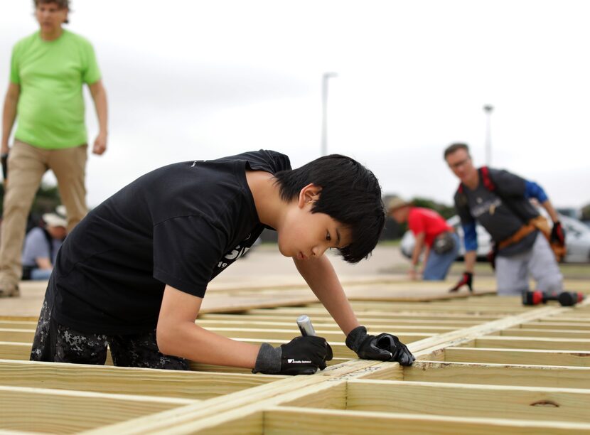 Jaiden Chiang, 13, pitched in on the homebuilding project.