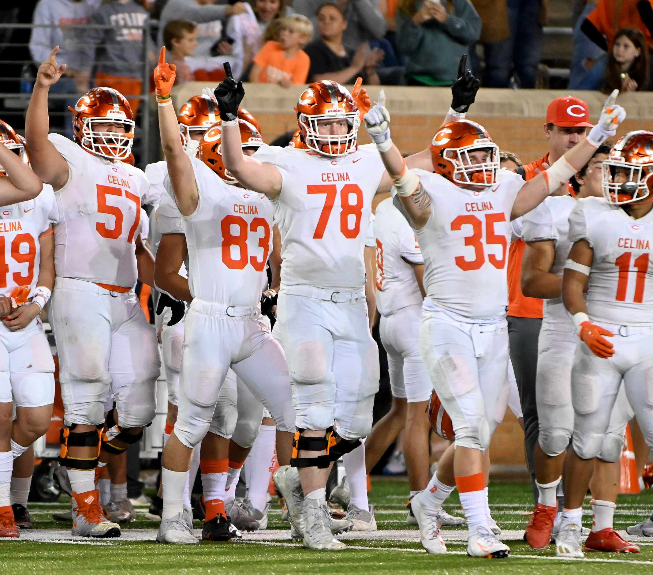 Celina players celebrate after their 34-0 win of a Class 4A Division II Region I final high...