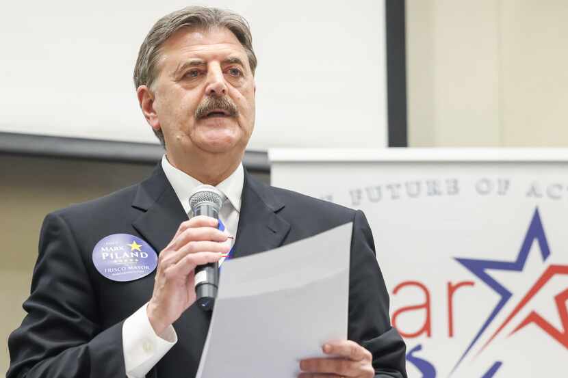 Frisco mayoral candidate and former fire chief Mark Piland shares an opening statement at a...