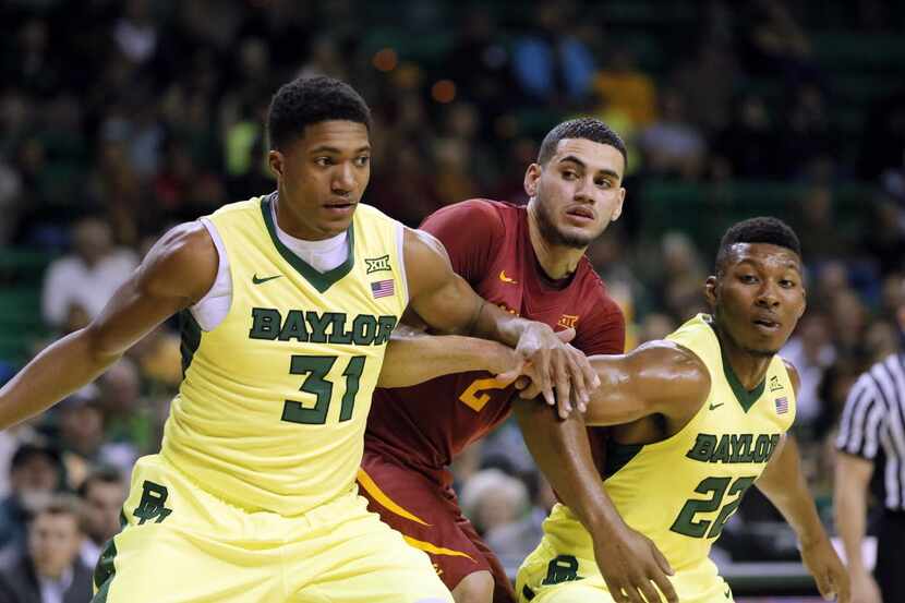 Baylor's Terry Maston (31) and King McClure (22) block out against Iowa State's Abdel Nader,...