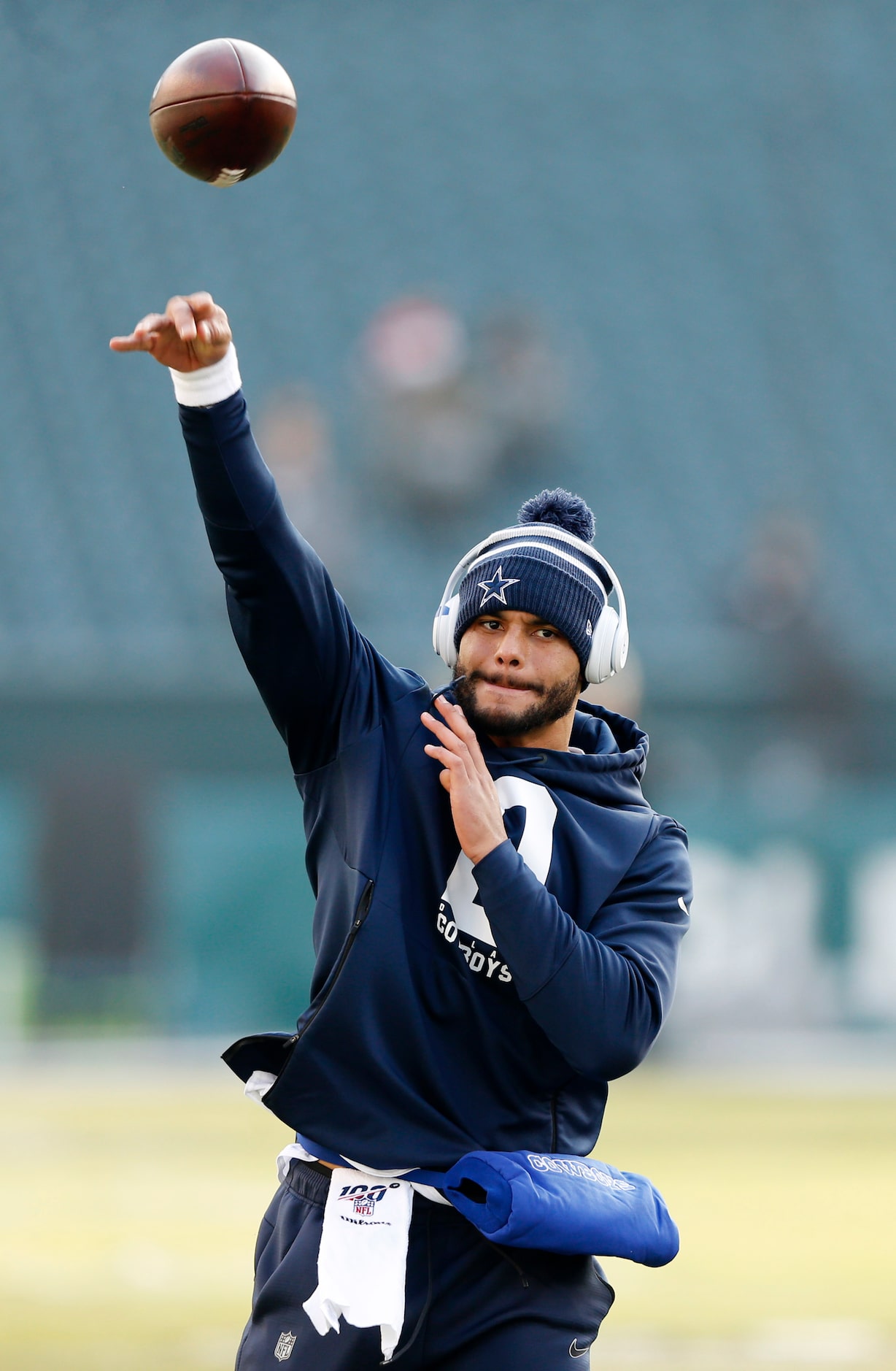 Dallas Cowboys quarterback Dak Prescott (4) throws the ball before warmups prior to a game...