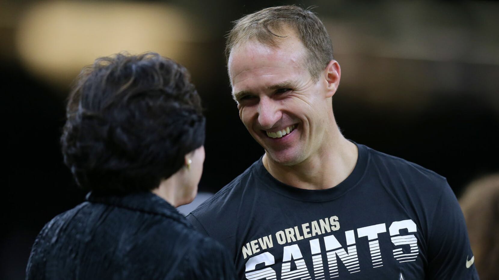 NEW ORLEANS, LOUISIANA - AUGUST 29: Drew Brees #9 of the New Orleans Saints talks to Saints...