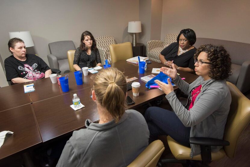 Lesli Jenkins  (right), an occupational therapist with Baylor Institute for Rehabilitation,...