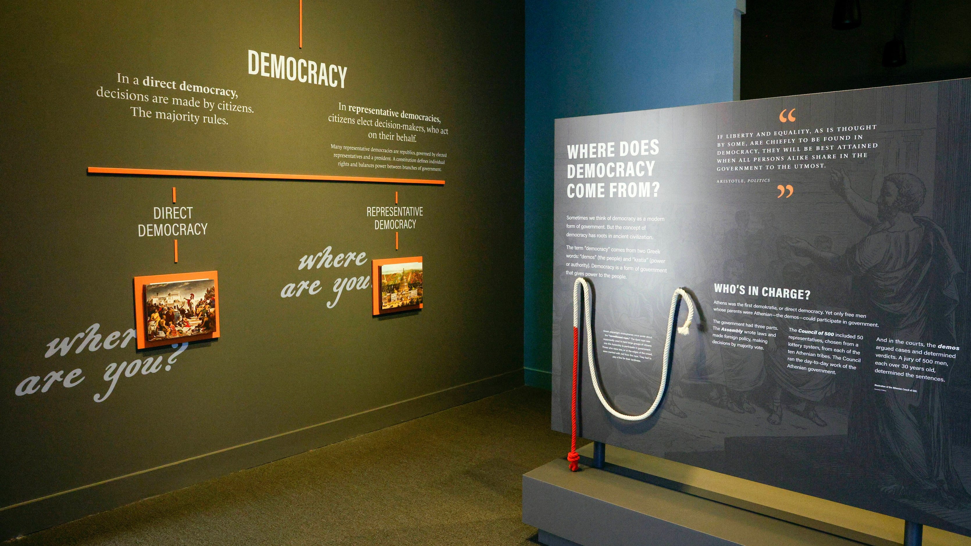 Displays explain the history and types of democracy at the Freedom Matters exhibit at The...