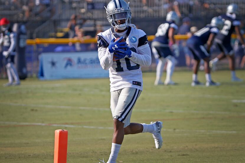 Dallas Cowboys running back Tavon Austin catches a touchdown pass during afternoon practice...