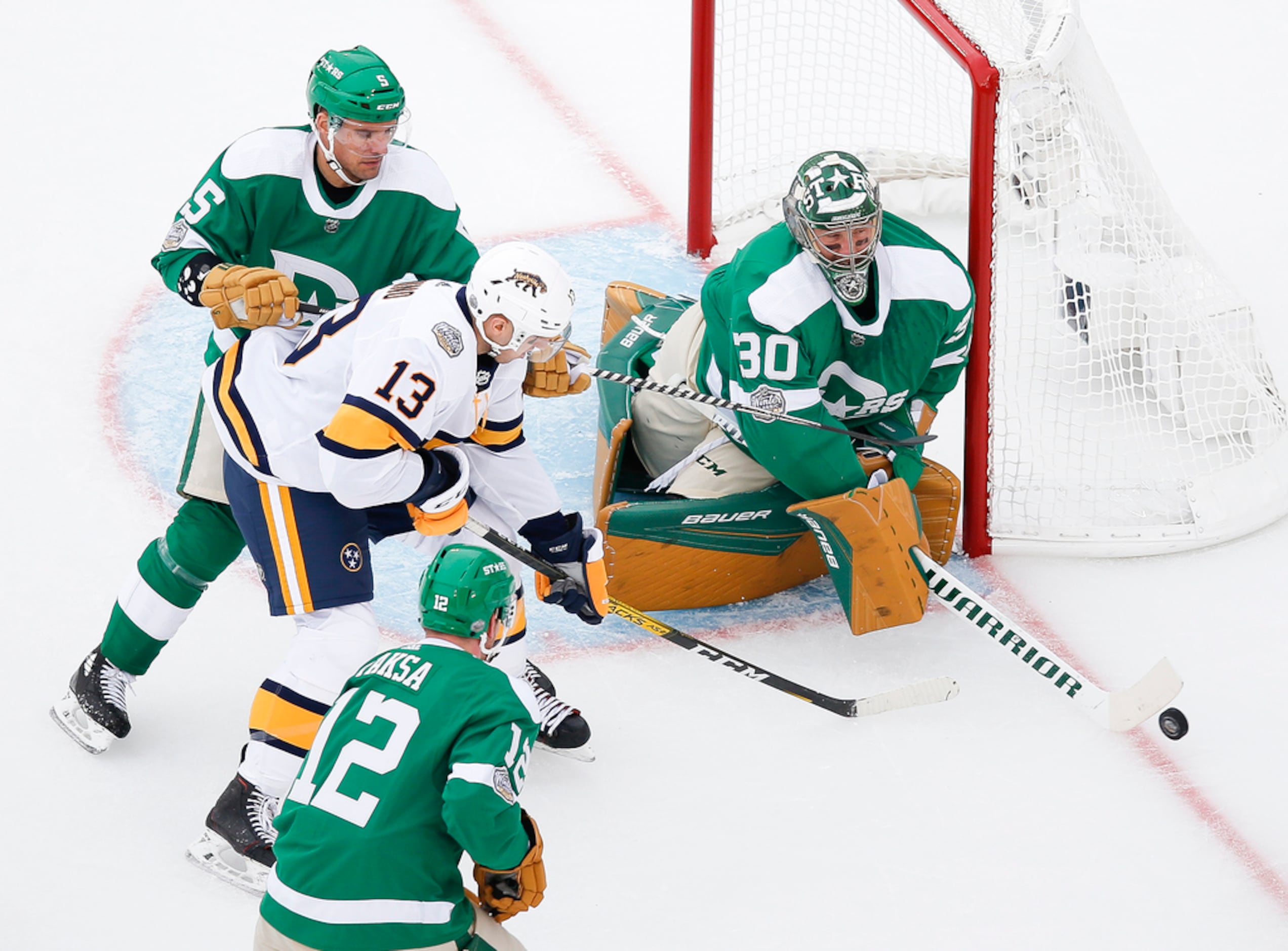 Dallas Stars goaltender Ben Bishop (30) blocks a shot by Nashville Predators center Nick...