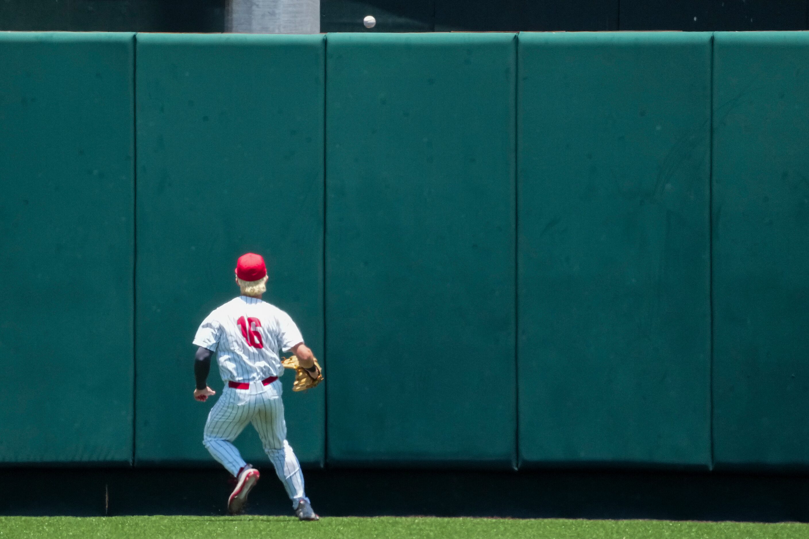 Argyle left fielder Conor Lillis (16) watches as a home run off the bat of China Spring...