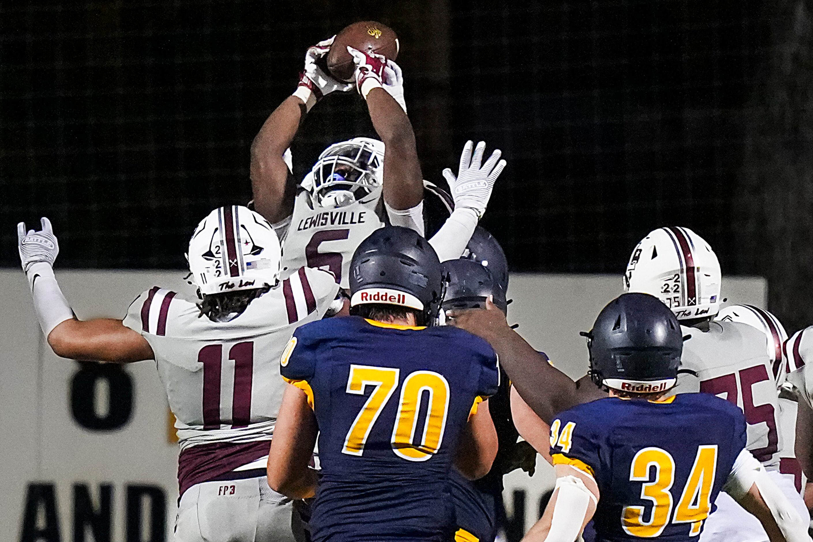 Lewisville linebacker Michael Cooper (6) breaks up a pass in the end zone as a goal line...