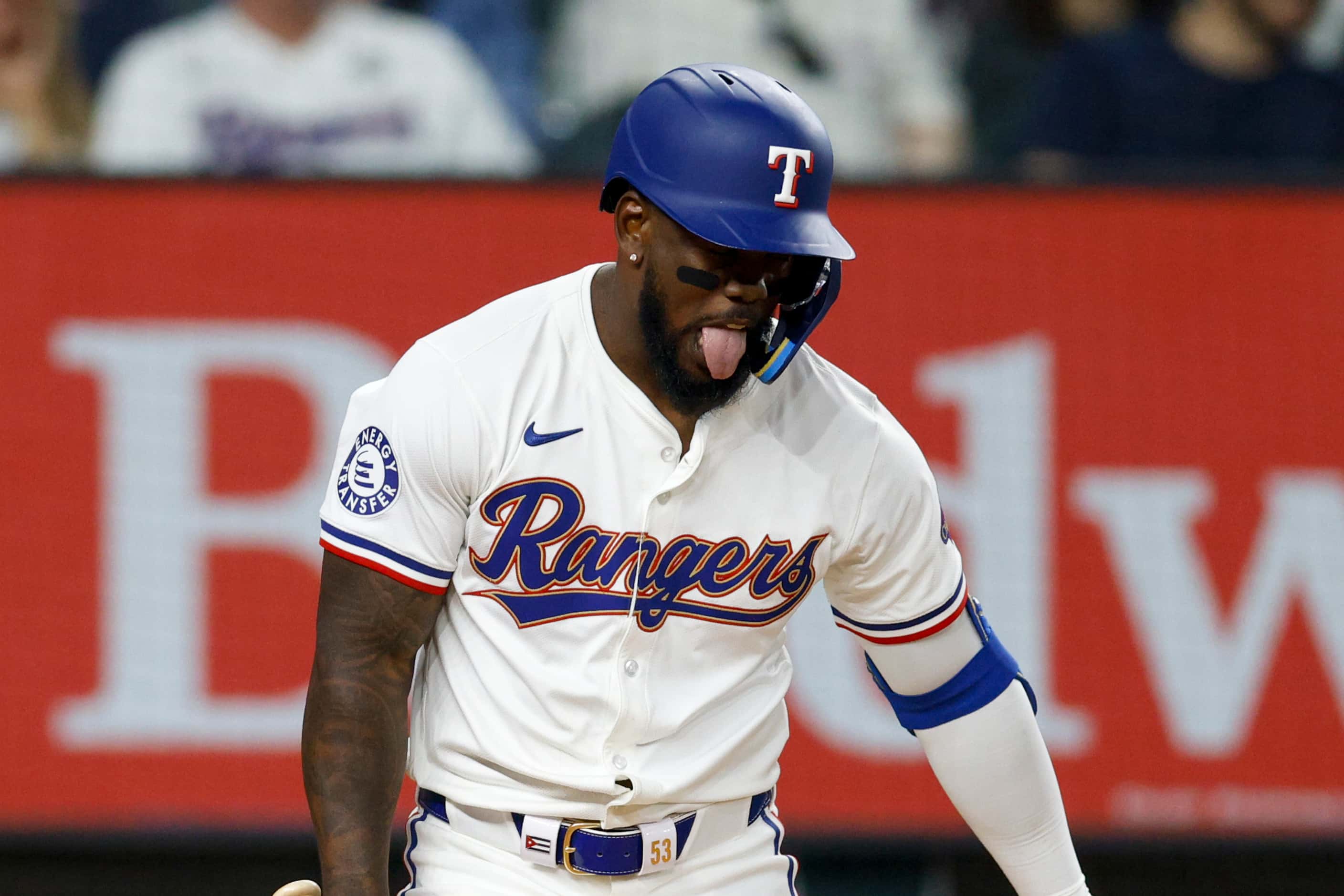 Texas Rangers right fielder Adolis Garcia (53) reacts after almost being hit by a pitch...