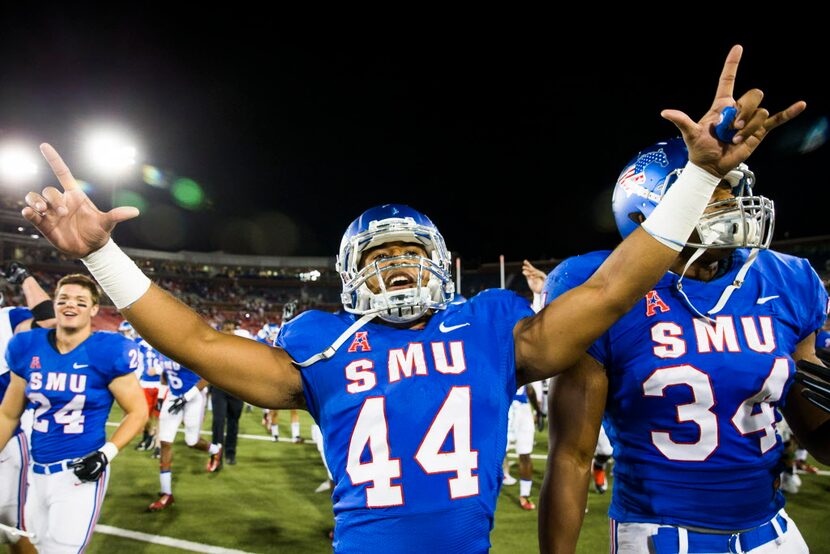 SMU linebacker Jackson Mitchell celebrates after the Mustangs 31-13 victory over North Texas...