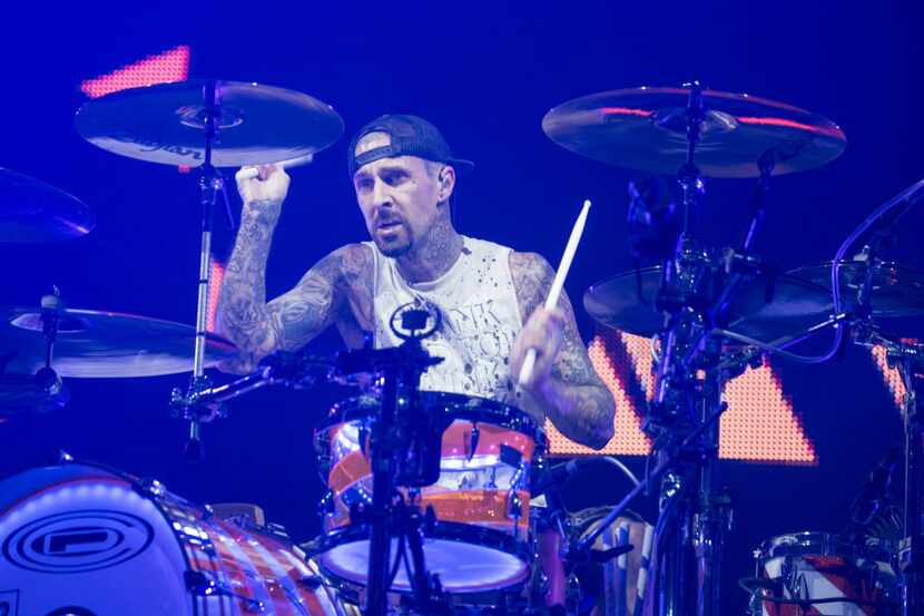 Travis Barker, drummer for Blink-182, performs at Gexa Energy Pavilion Friday, July 29,...