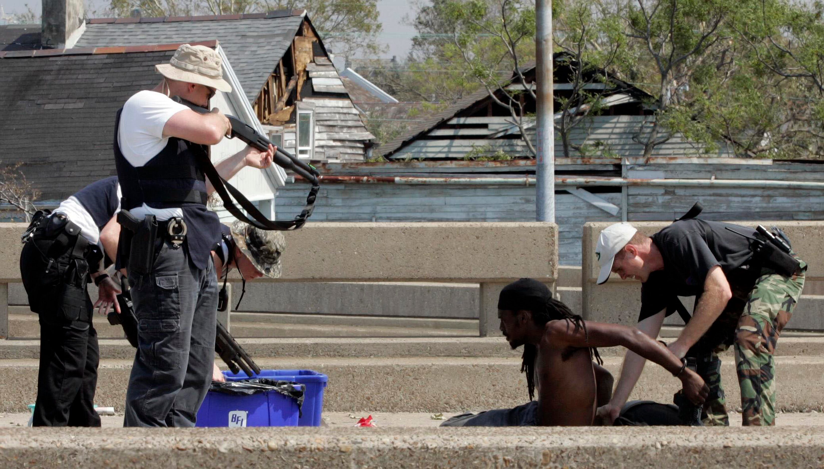 Police searched a man accused of looting on Interstate 10. They found beer in his bag. 