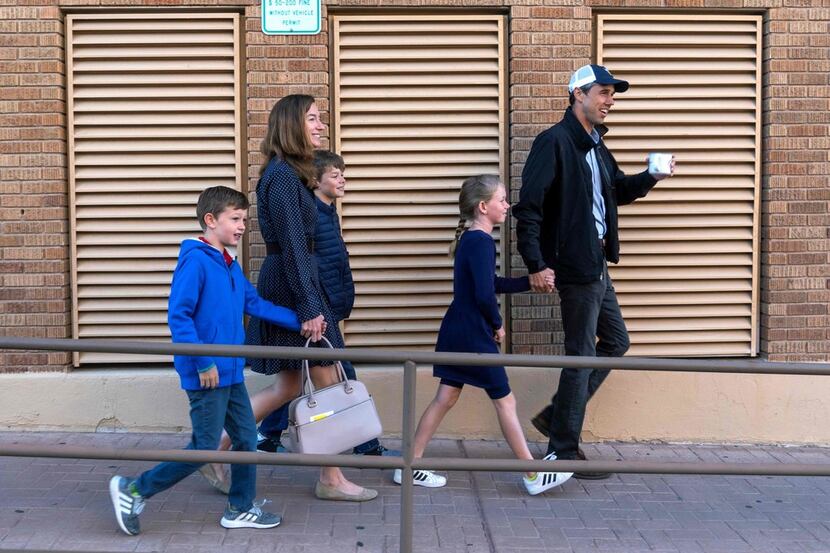 On Nov. 6, 2018, Beto ORourke walks with his wife, Amy Hoover Sanders, and children, Ulysses...
