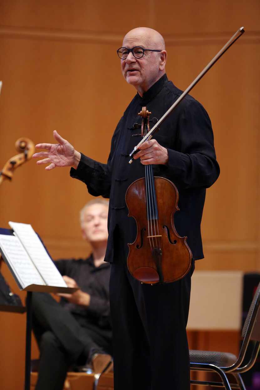 Violist and composer Atar Arad speaks to the audience during the Chamber Music International...