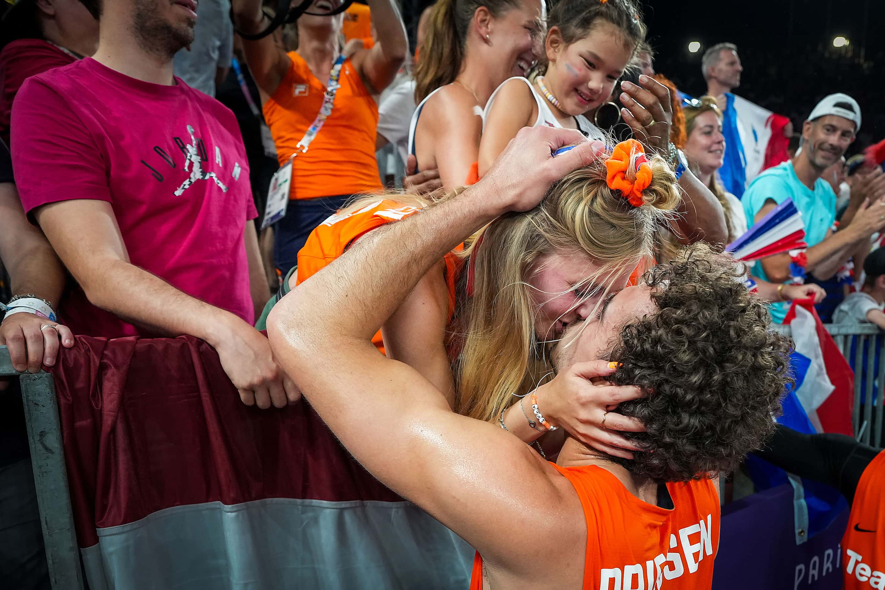 Jan Driessen of the Netherlands gets a kiss as he celebrates a victory over France in the...