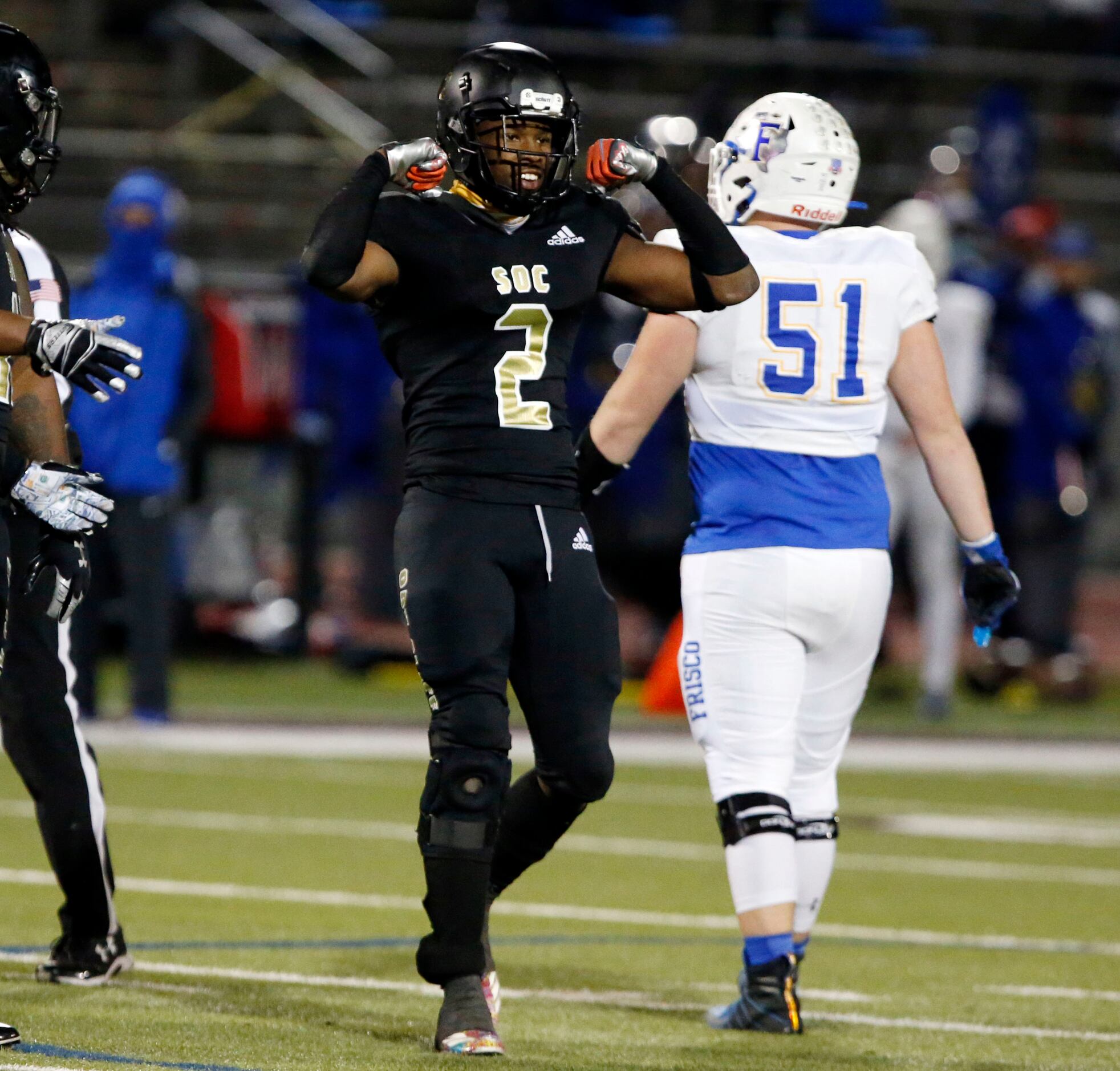 South Oak Cliff LB Jaydon Williams (2) flexes his muscles after making a sack during the...