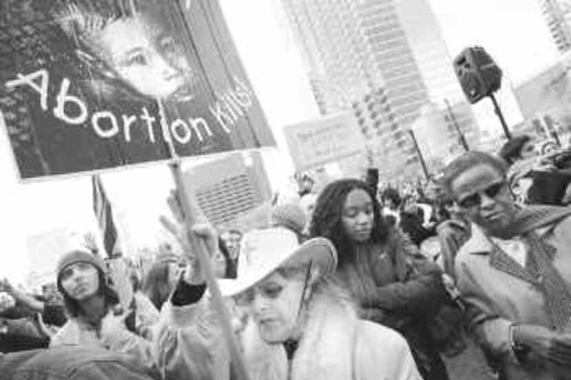  Dorothy Rino (center) marches with thousands of others who oppose abortion. Saturday's...