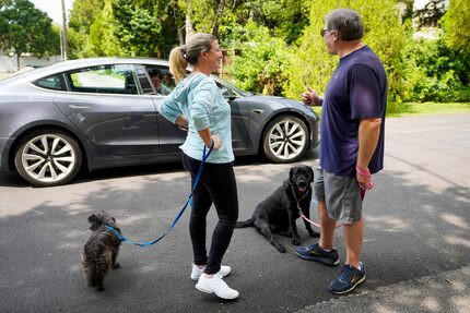 Michael Hoffman gave a thumbs up to his neighbors, who stopped to ask how he and wife Jackie...